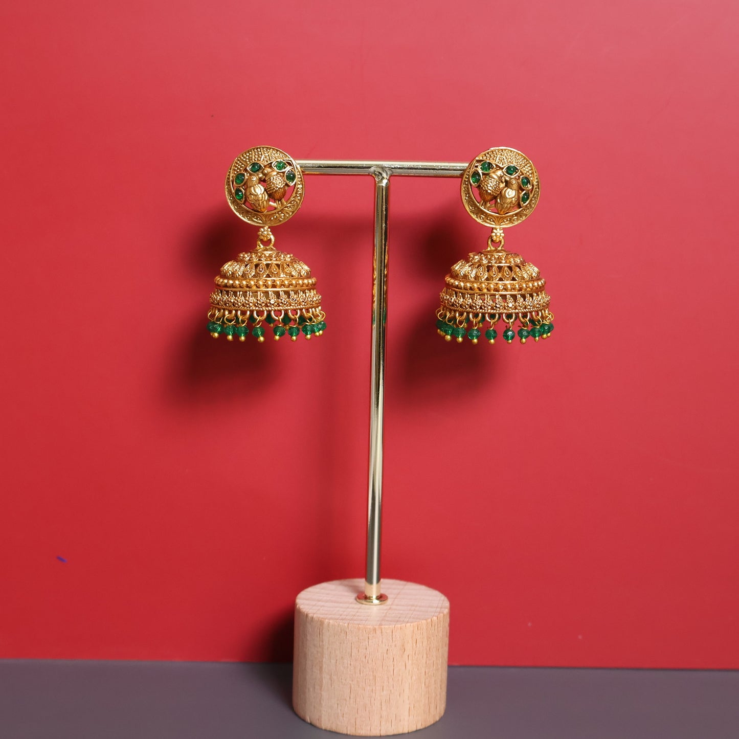 Antique Gold Jhumka Earrings with Green Bead Drops