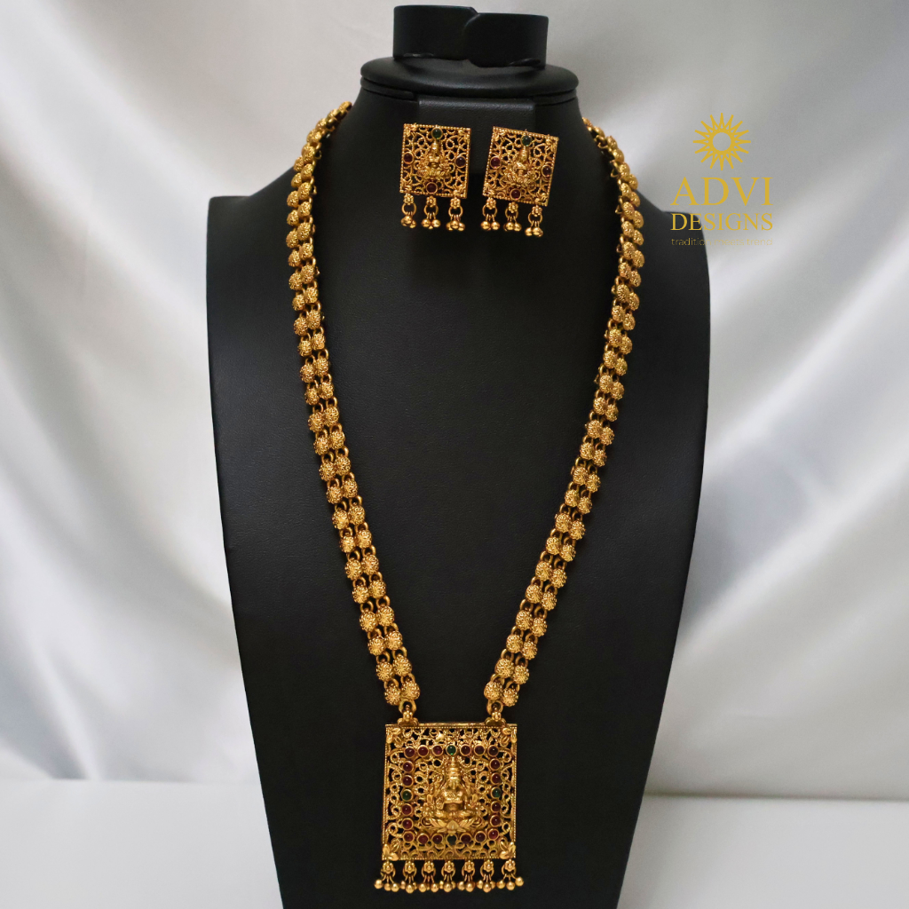 Antique Gold Lakshmi Pendant Long Haram Set with Temple Design Earrings