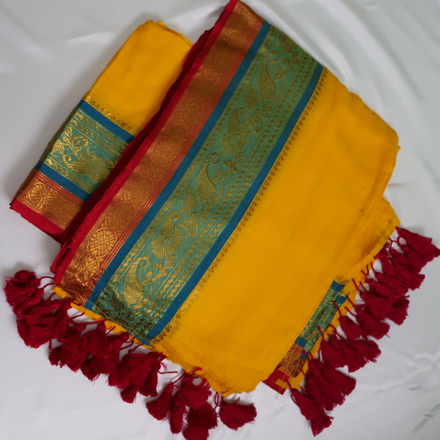 Sunshine Yellow Mul Cotton Saree with Teal Blue & Red Zari Border