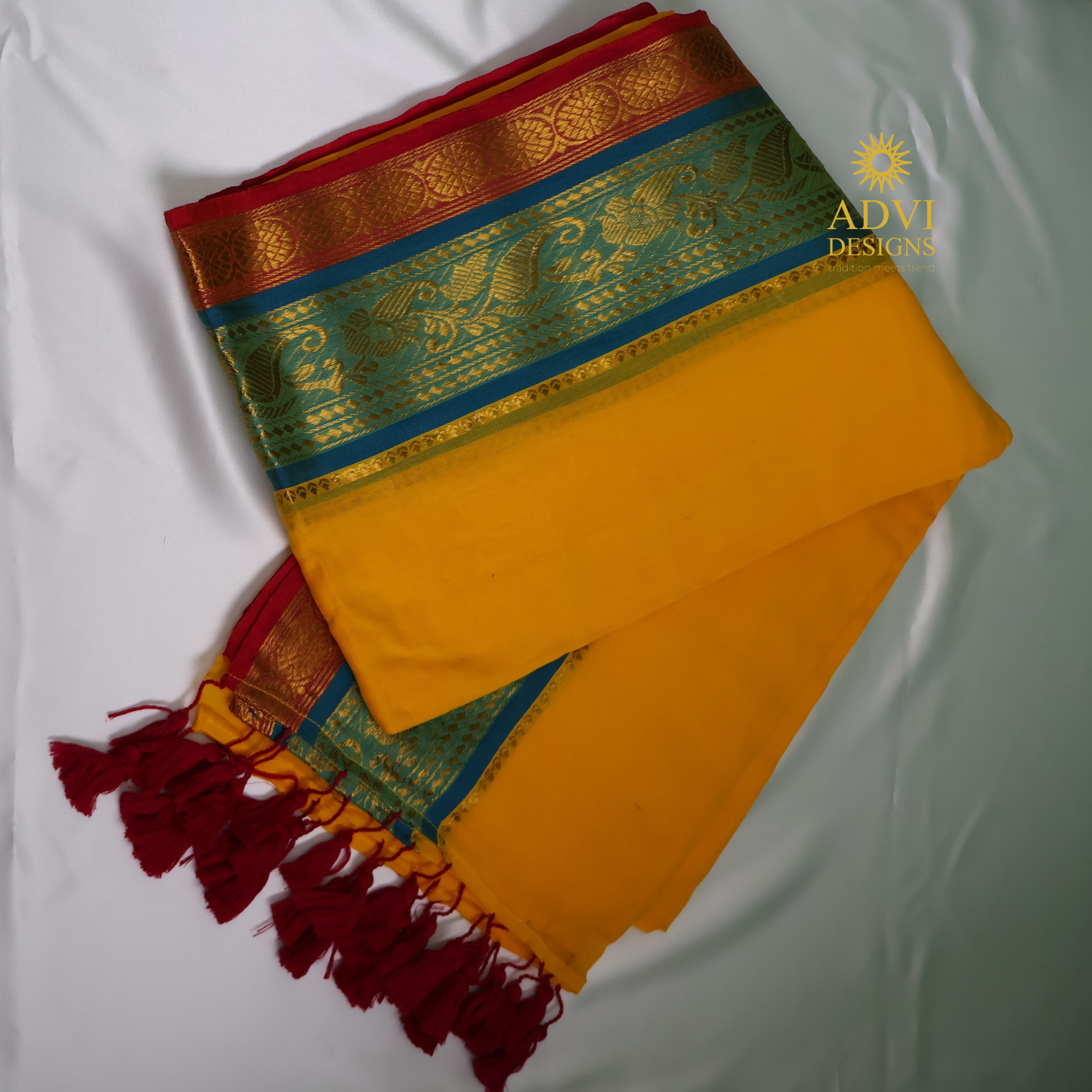 Sunshine Yellow Mul Cotton Saree with Teal Blue & Red Zari Border