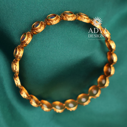 Antique Gold Peacock Eye Bangle with Traditional Design
