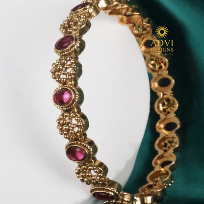 Traditional Kemp Stone Bangles Set with Deep Magenta Stones – Gold Finish