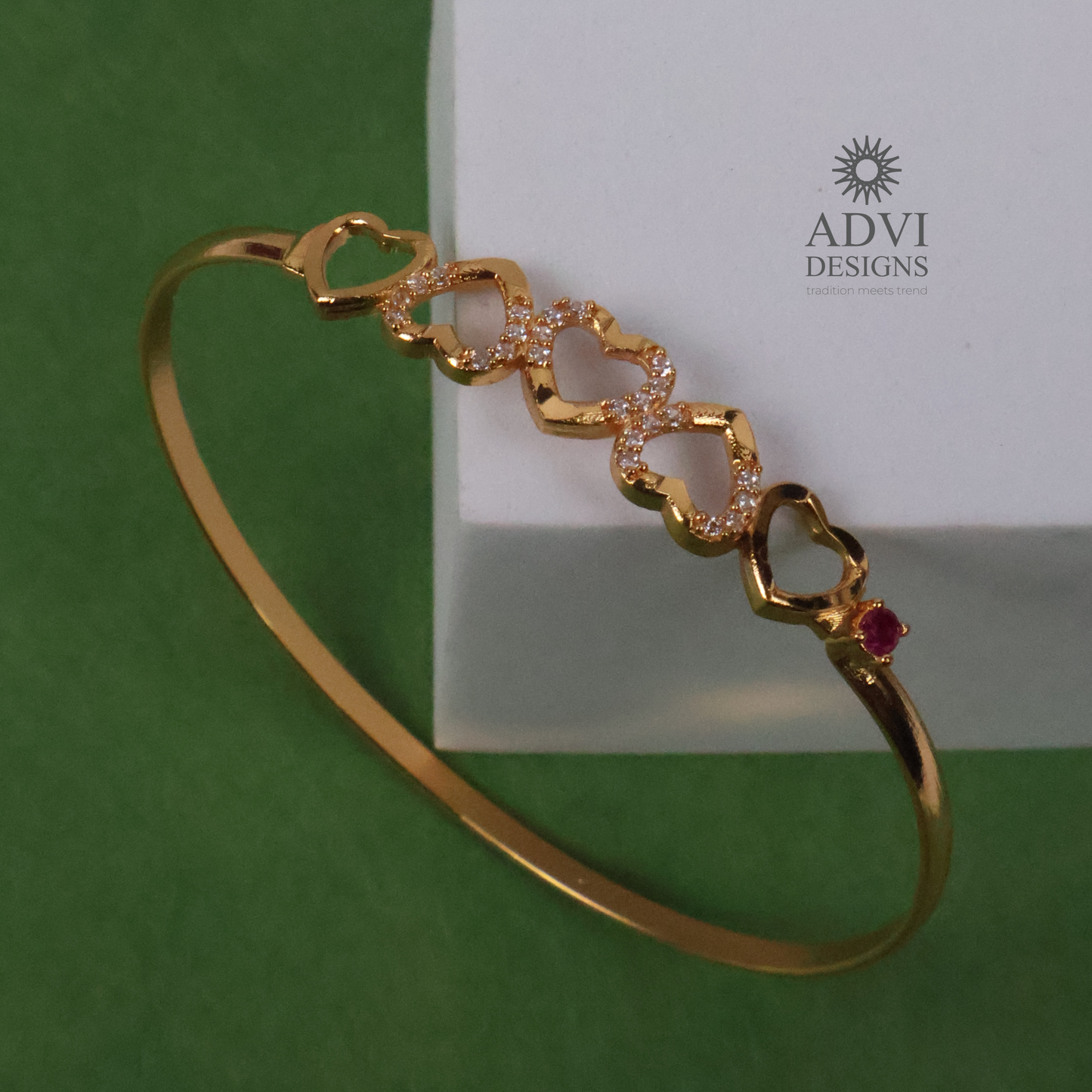 Gold-Tone Heart Design Bangle with Clear Stones & Pink Accent