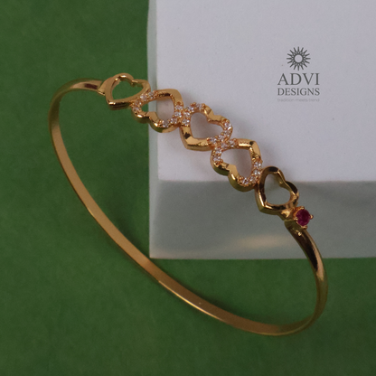 Gold-Tone Heart Design Bangle with Clear Stones & Pink Accent