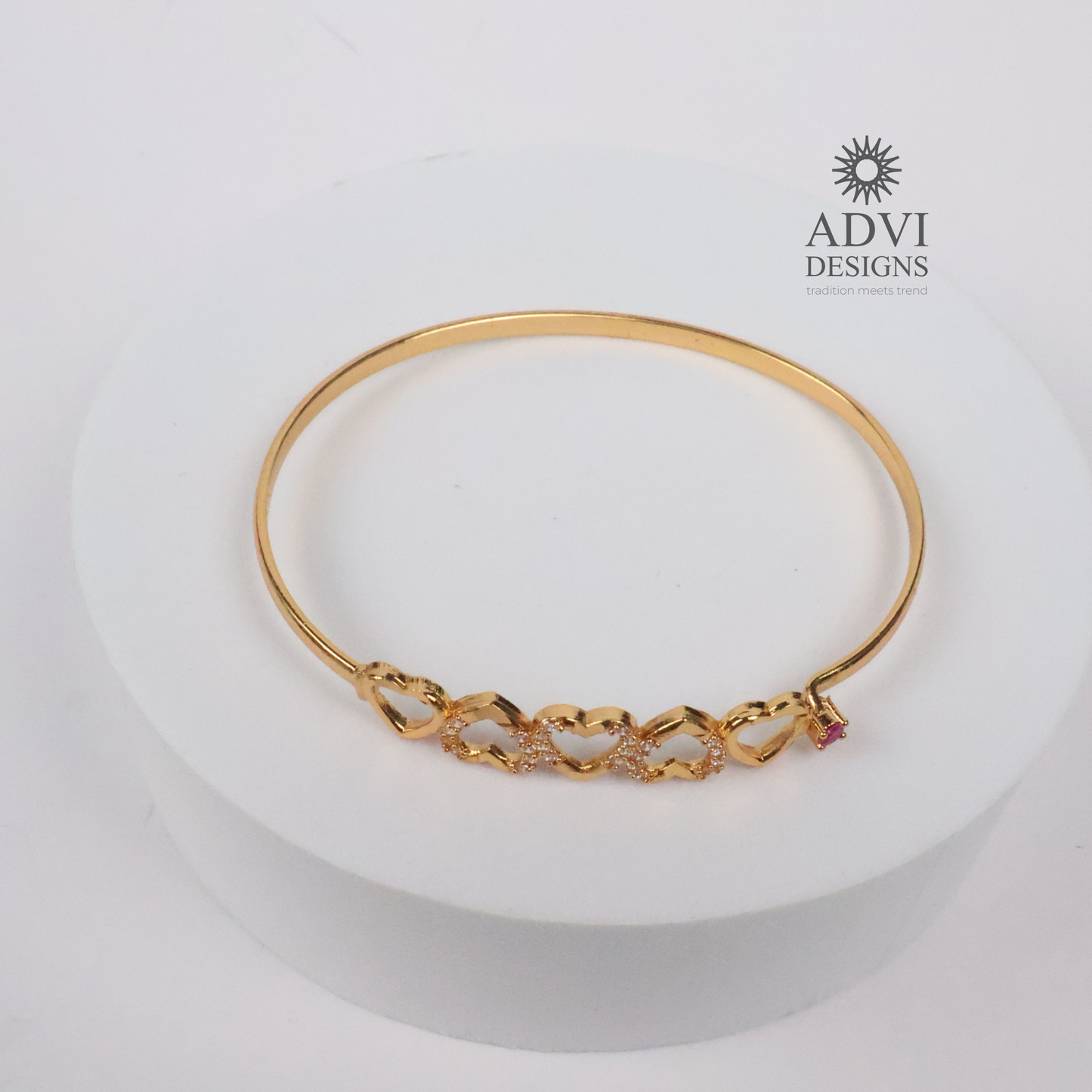 Gold-Tone Heart Design Bangle with Clear Stones & Pink Accent