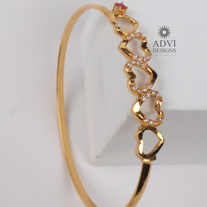Gold-Tone Heart Design Bangle with Clear Stones & Pink Accent