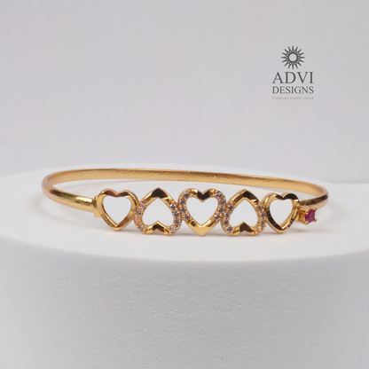 Gold-Tone Heart Design Bangle with Clear Stones & Pink Accent