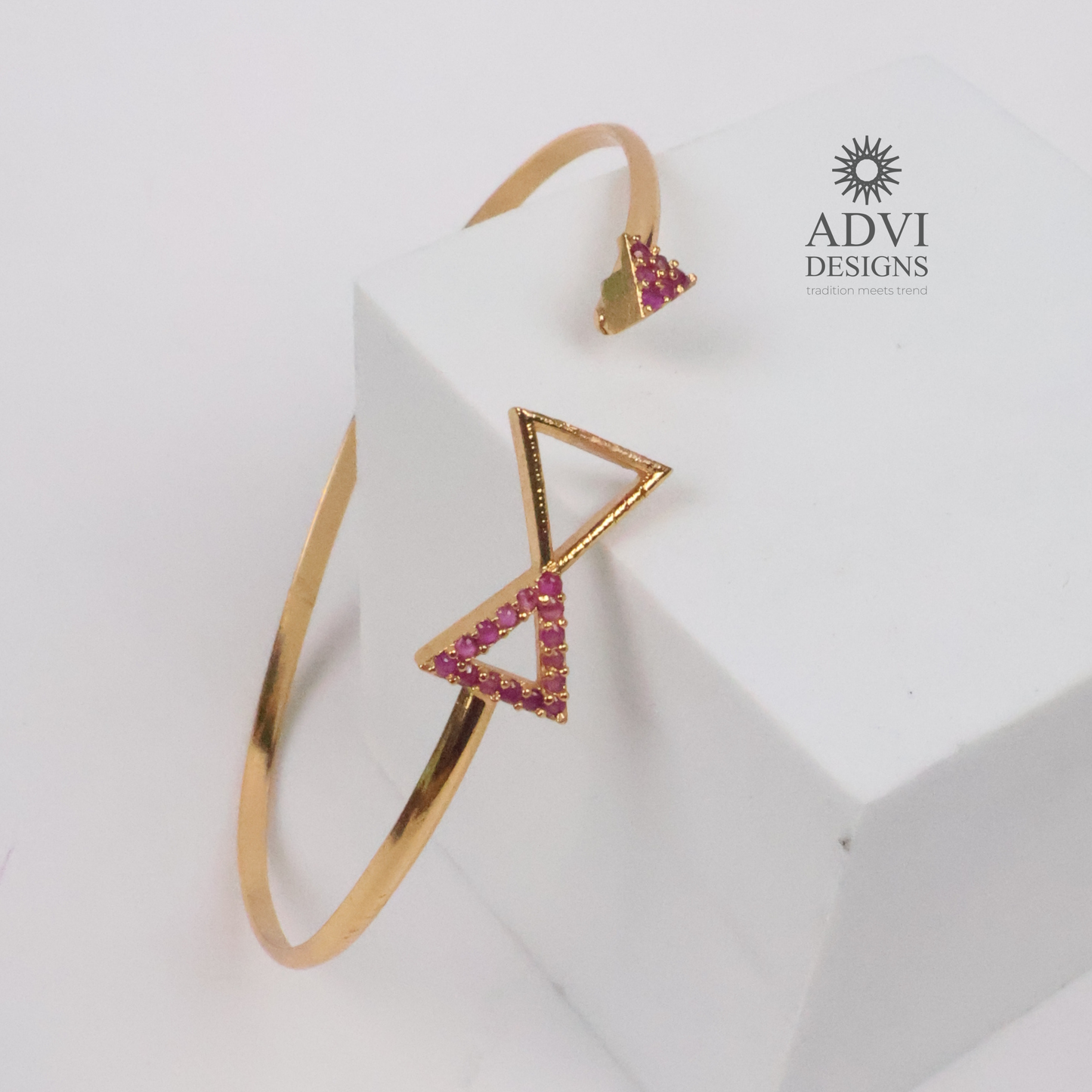 Gold-Tone Geometric Triangle Bangle with Pink Stone Detailing