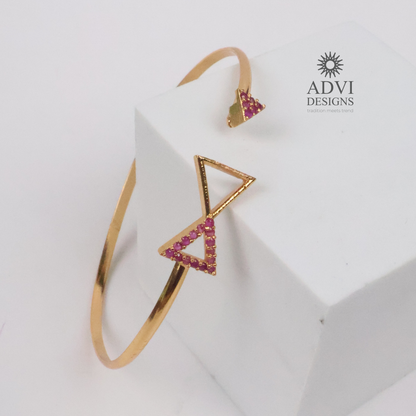 Gold-Tone Geometric Triangle Bangle with Pink Stone Detailing