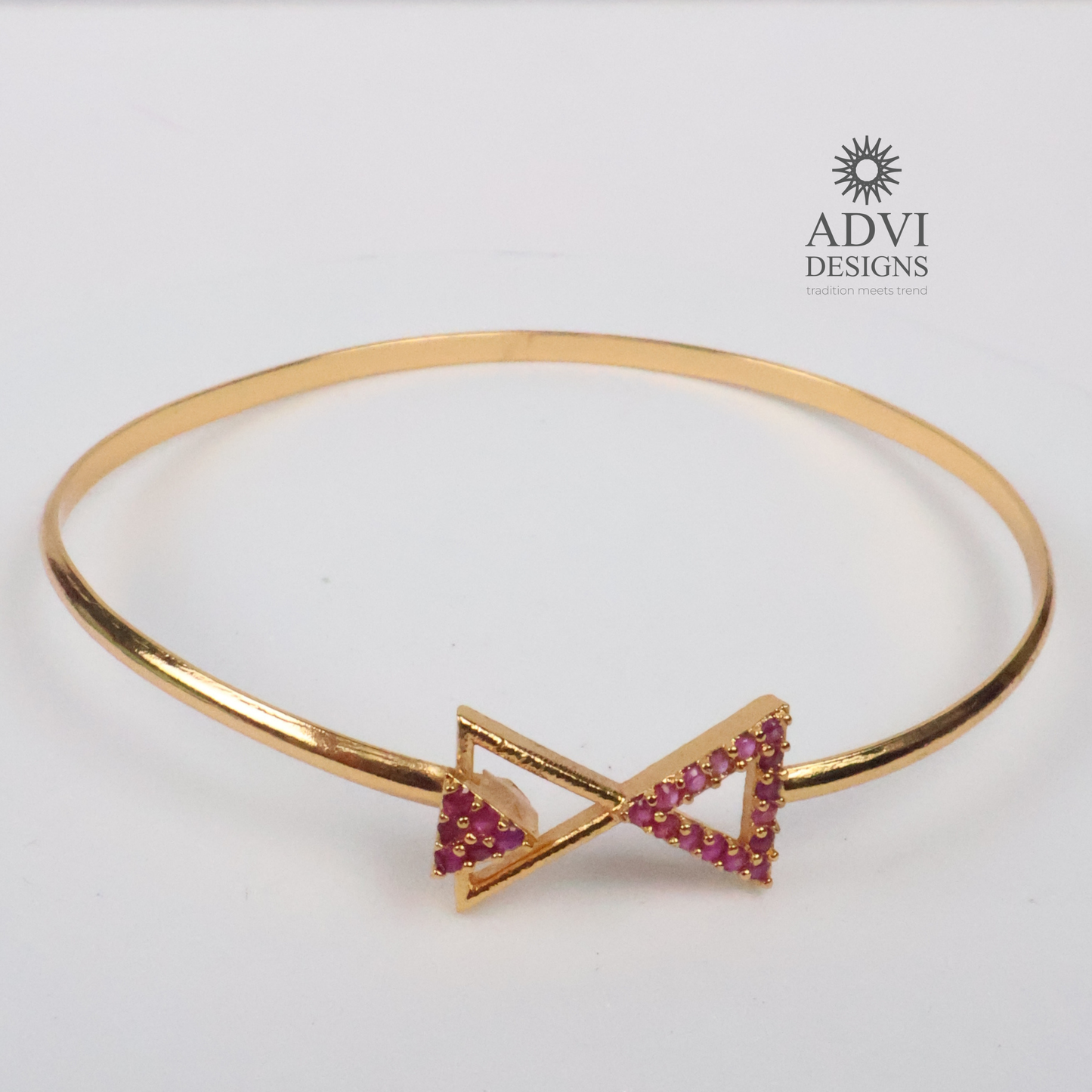 Gold-Tone Geometric Triangle Bangle with Pink Stone Detailing