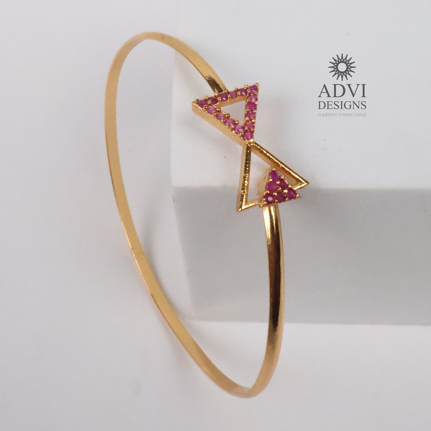 Gold-Tone Geometric Triangle Bangle with Pink Stone Detailing