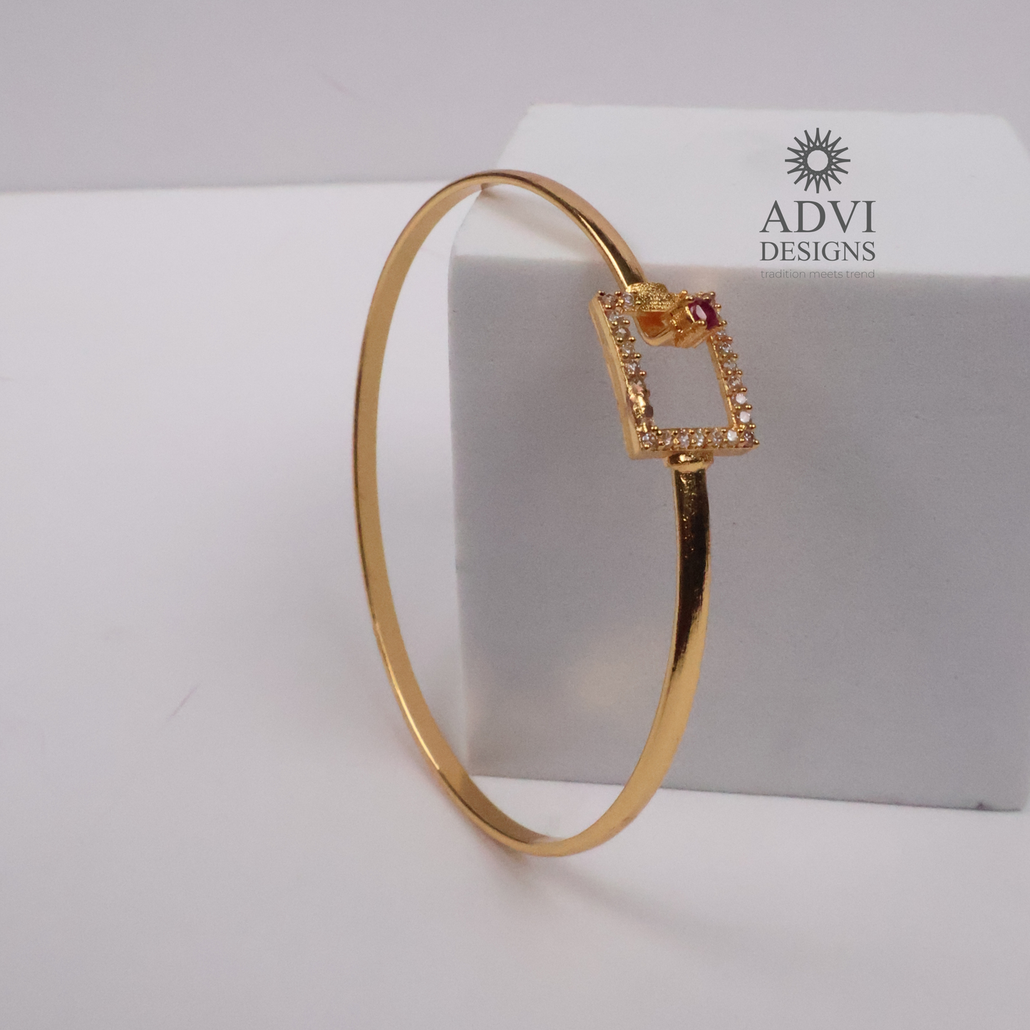 Gold-Tone Geometric Square Bangle with Ruby-Colored Stone & CZ Detailing