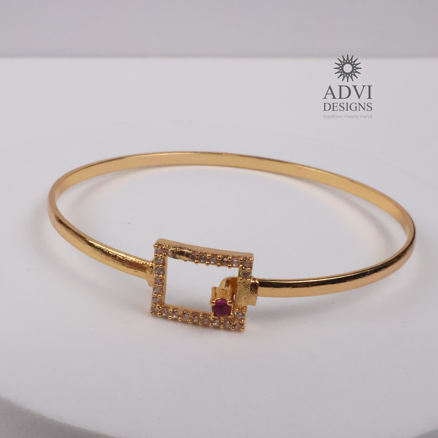 Gold-Tone Geometric Square Bangle with Ruby-Colored Stone & CZ Detailing