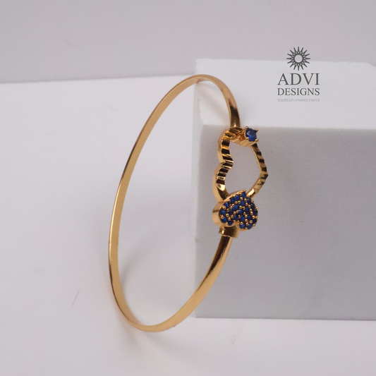 Gold-Tone Heart Bangle with Blue Stone & Beaded Stone Detailing