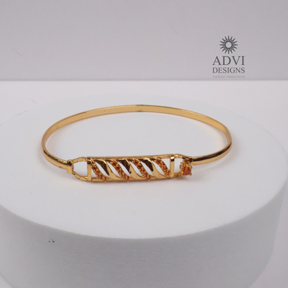 Gold-Tone Geometric Bangle with Diagonal Crystal Detailing & Orange Stone