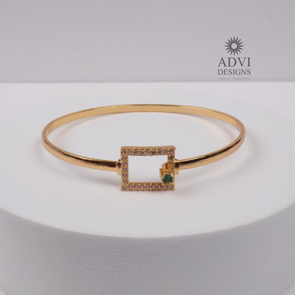 Gold-Tone Geometric Bangle with Green Stone & Crystal Detailing