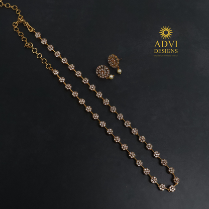 Premium AD Stone Floral Long Necklace Set with Pearl Drop Earrings | Antique Gold Finish