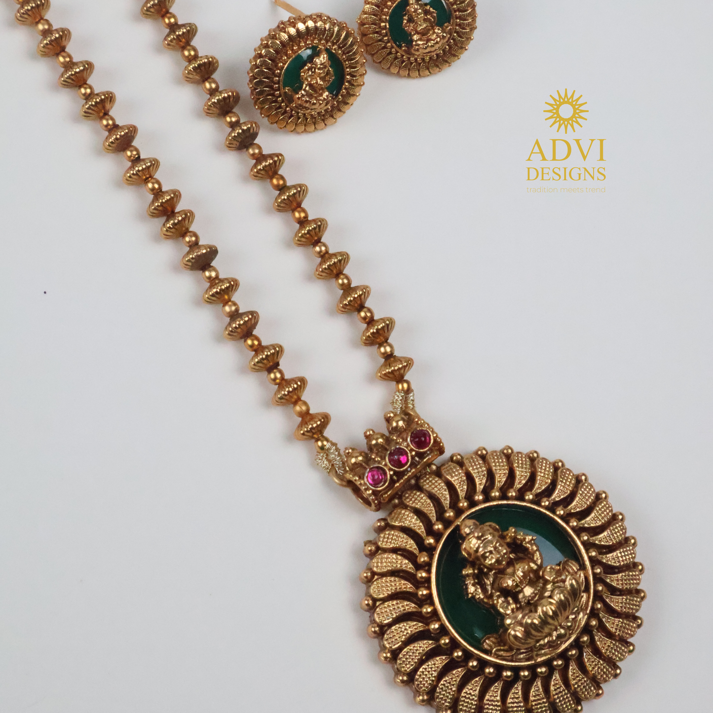 Antique Gold Lakshmi Pendant Haram with Green Enamel & Pink Stone Accents