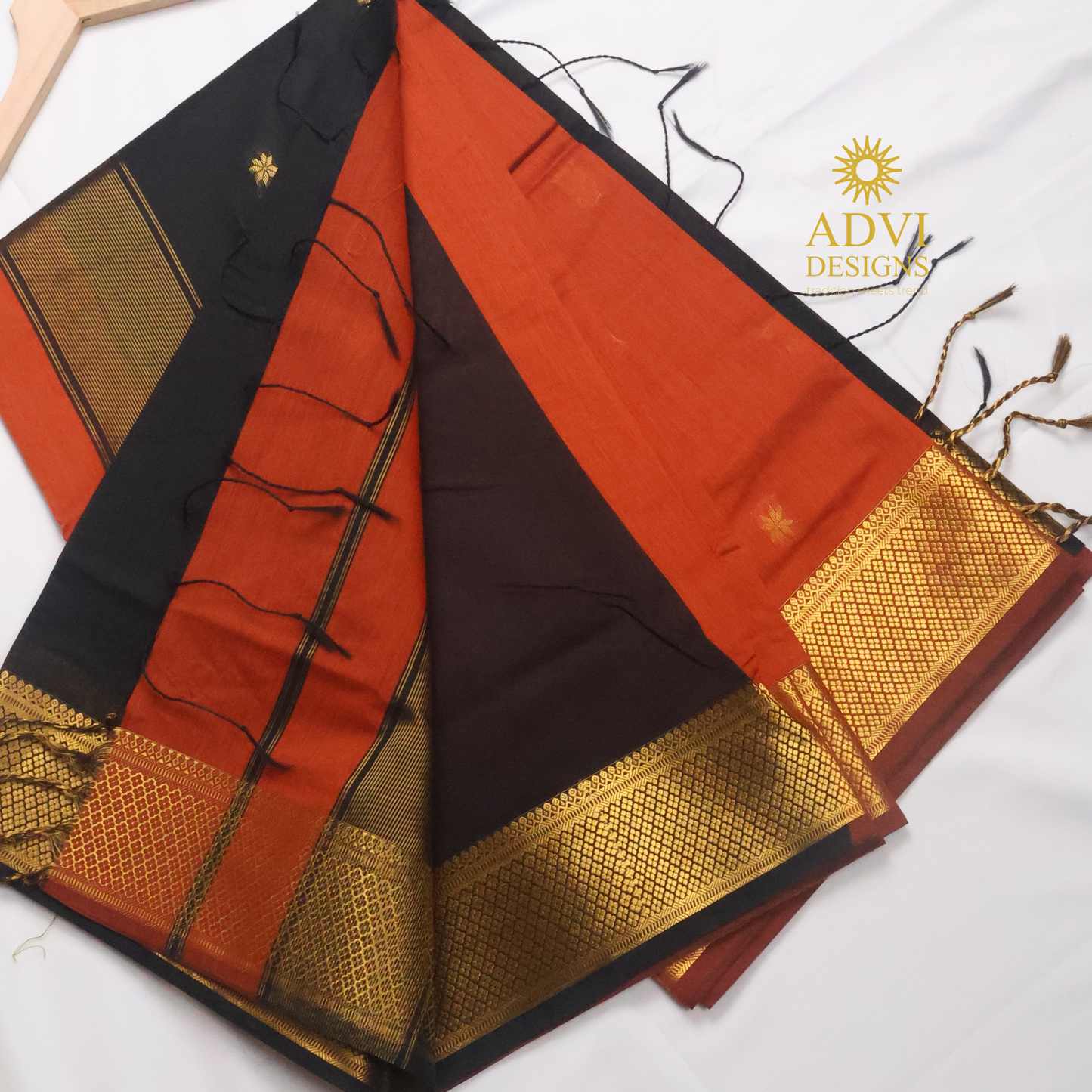 Maheshwari Silk Cotton Saree in Brick Orange with Black Contrast Pallu & Black Blouse | Gold Woven Motifs