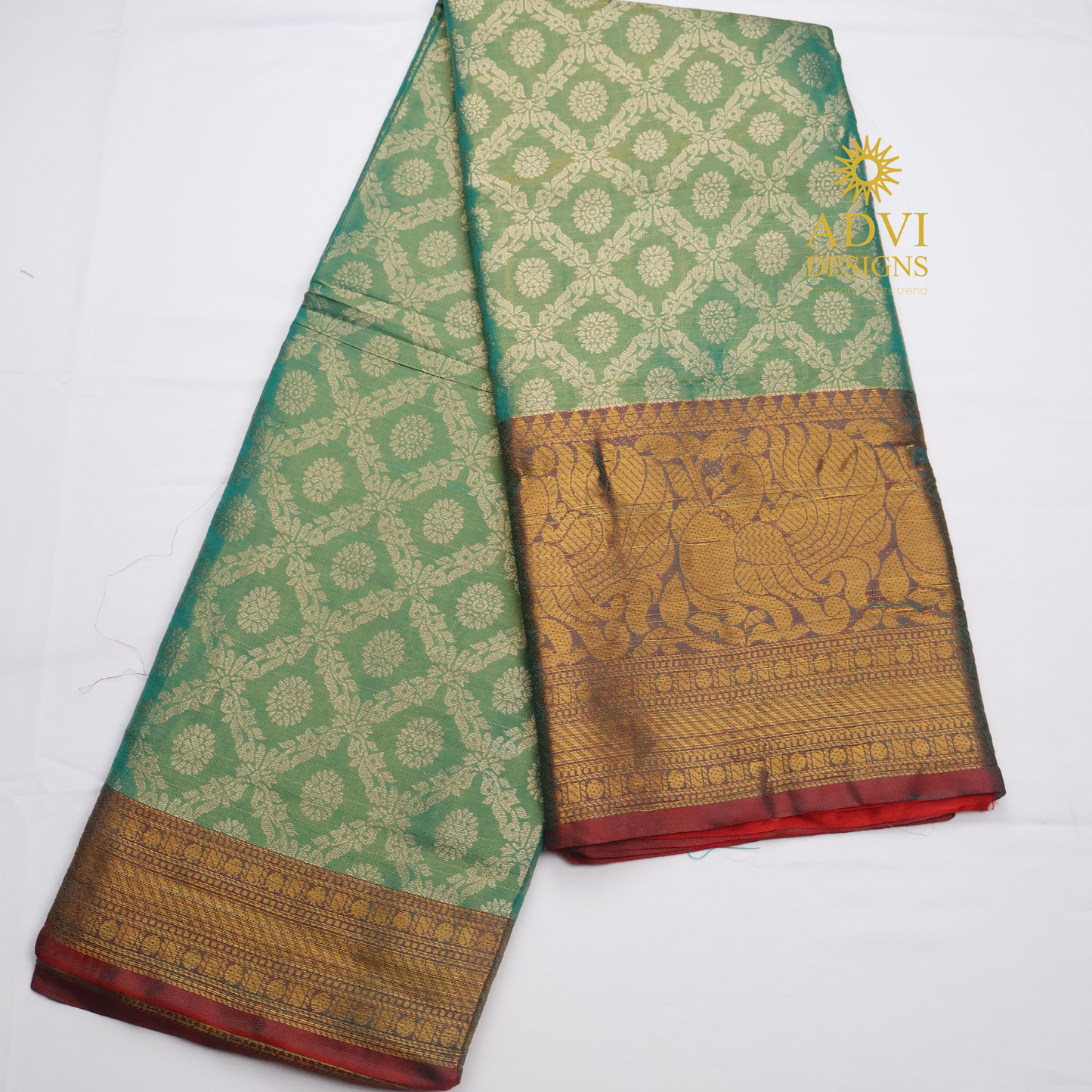 Sea Green Brocade Silk Saree with Antique Gold Zari Border & Rich Copper Brocade Pallu