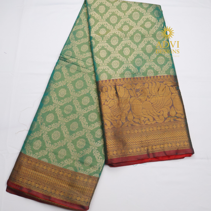 Sea Green Brocade Silk Saree with Antique Gold Zari Border & Rich Copper Brocade Pallu