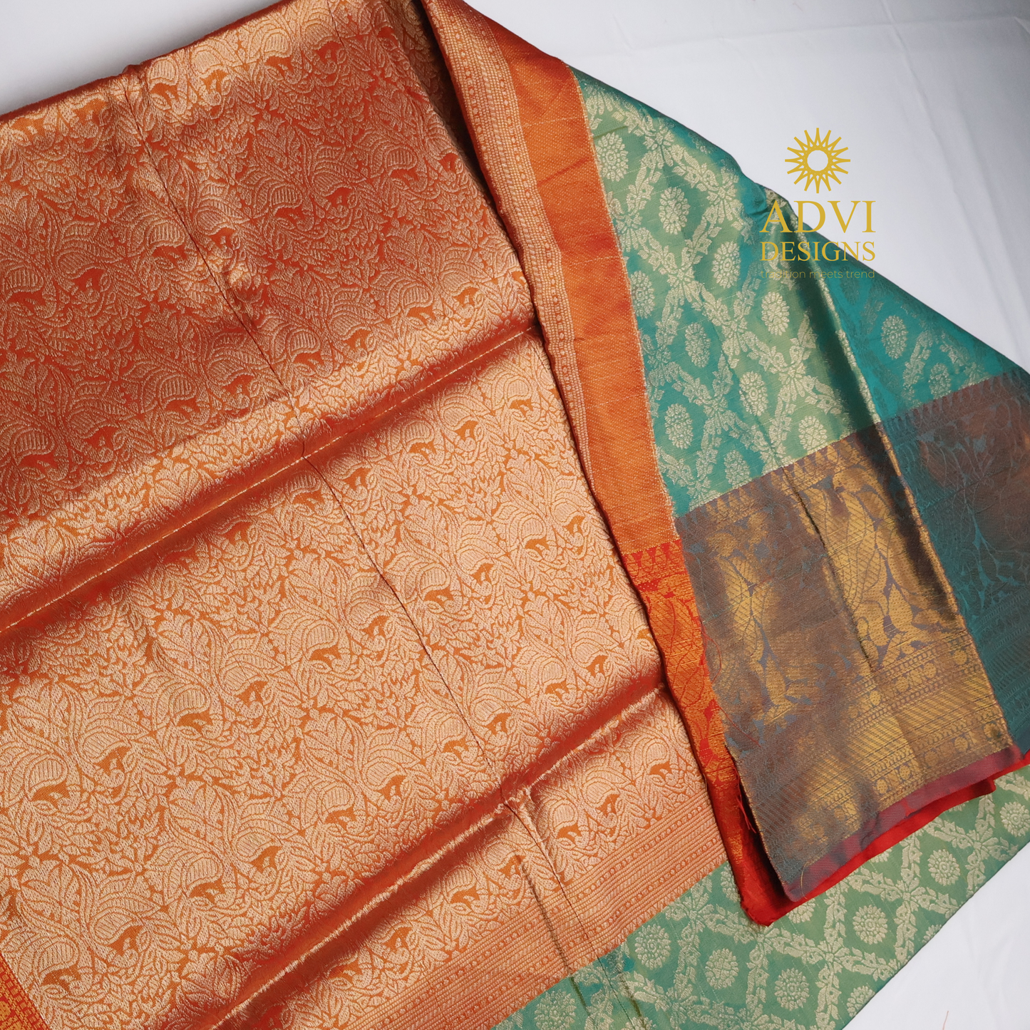 Sea Green Brocade Silk Saree with Antique Gold Zari Border & Rich Copper Brocade Pallu